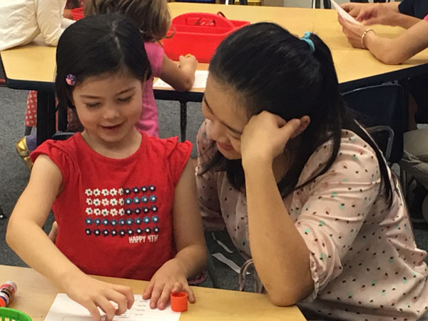 Chinese Immersion Teacher with student