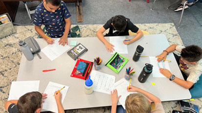 Students around table