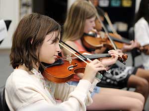 Student playing violin