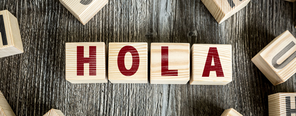 HOLA  spelled with blocks